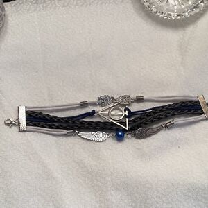 Bllack, White and Silvertone Multi Strand Bracelet